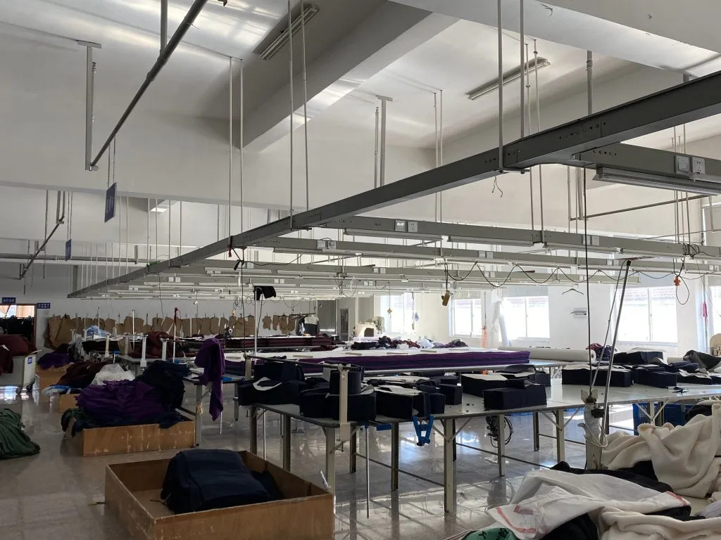 Fabric cutting workshop at Yuanchun